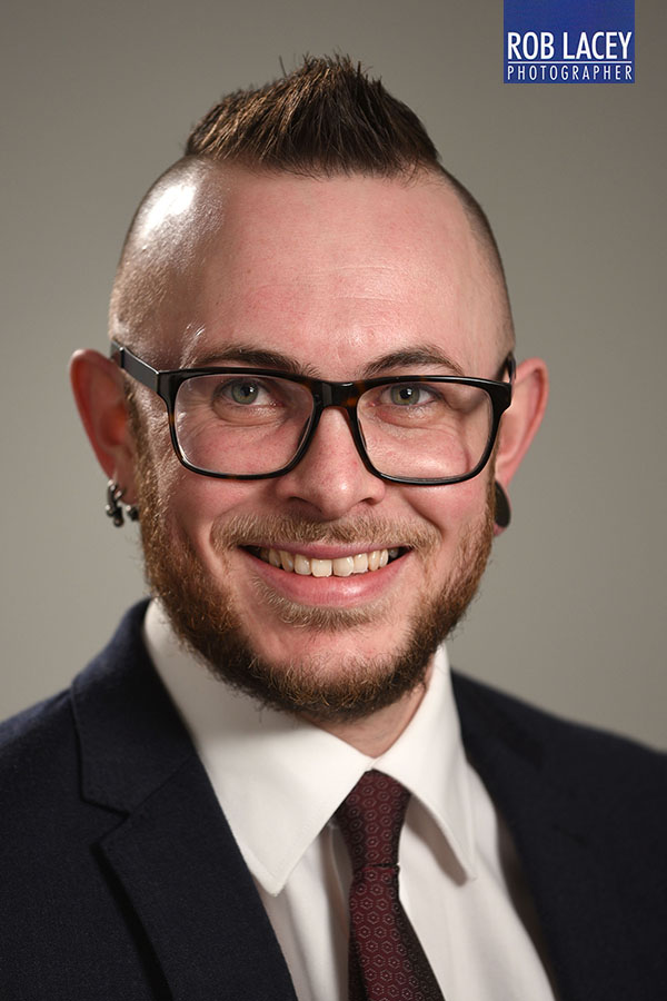 headshot male grey background 1