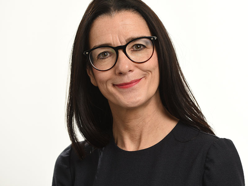 female headshot Birmingham glasses cropped white background