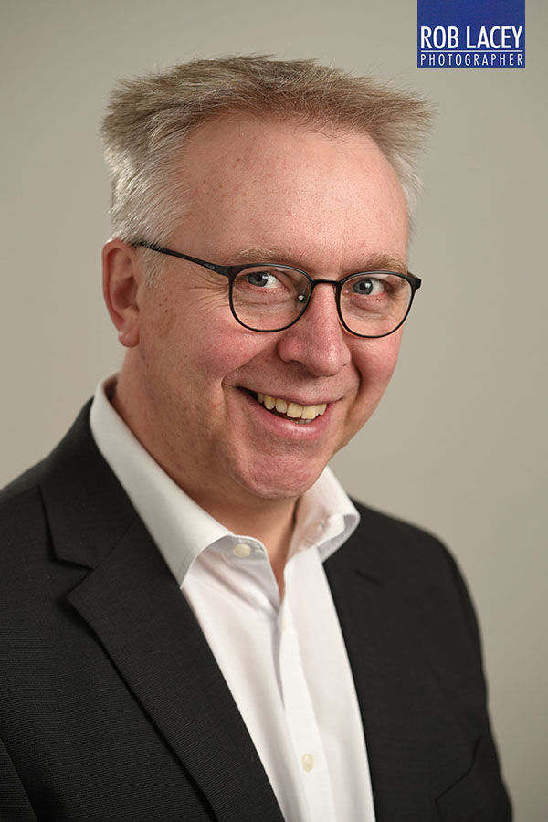 Headshot light grey background