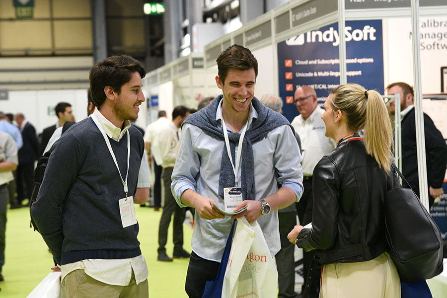 Delegates laughing at trade show