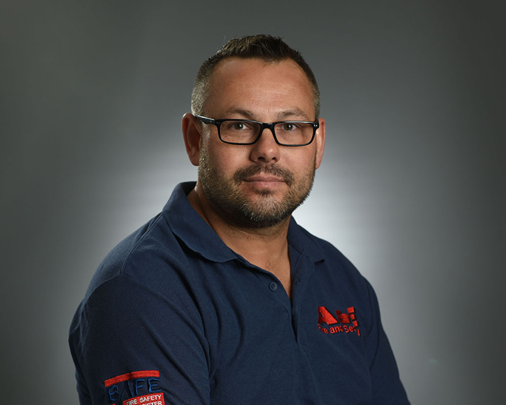 A&E Fire & Safety headshot male glasses