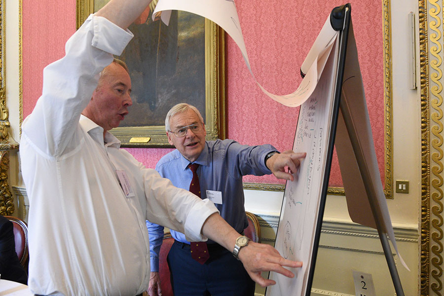 conference discussing with flipchart