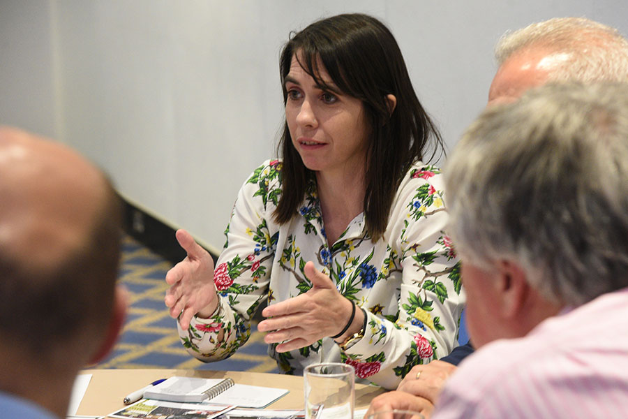 discussing at conference