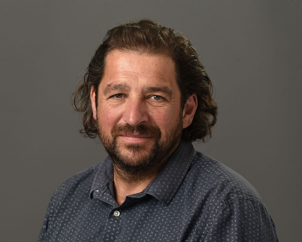 headshot male grey background